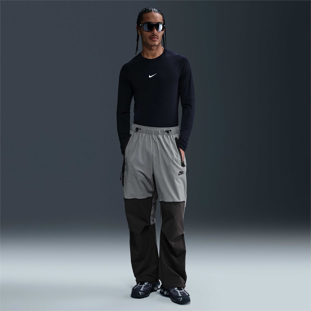 Купить оптом Брюки Nike M NK TCH WVN PANT OS HM7158-065 HM7158-065