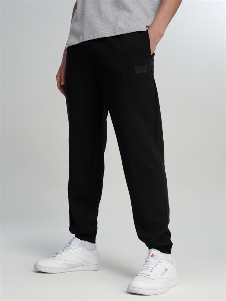 Купить оптом Брюки Reebok SILICONE BADGE PANT 100253136 100253136