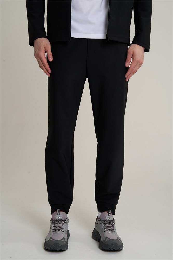 Купить оптом Брюки трикотажные Anta TRN Knit Track Брюки 852617302S-1 852617302S-1