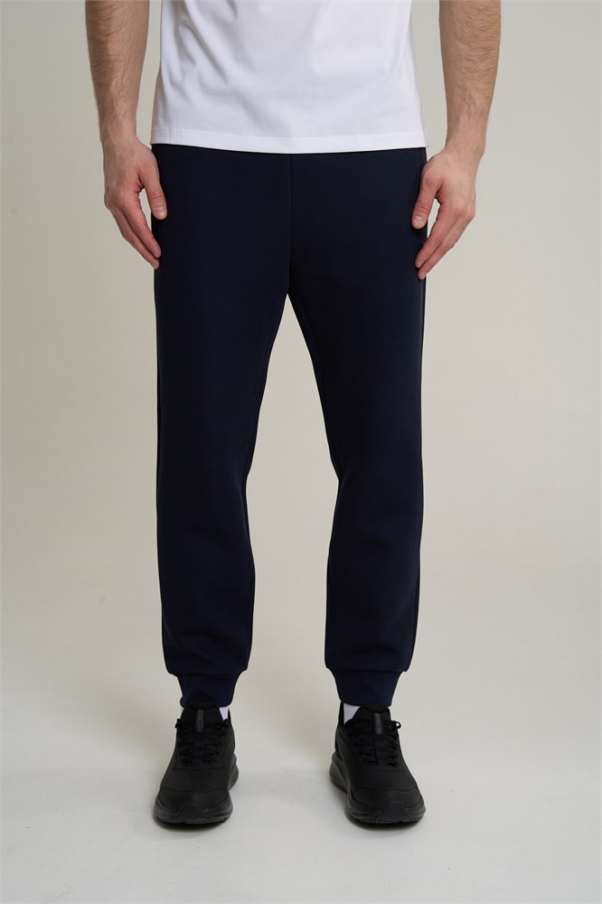 Купить оптом Брюки трикотажные Anta TRN ESSENTIAL Knit Track Брюки 852617309S-2 852617309S-2