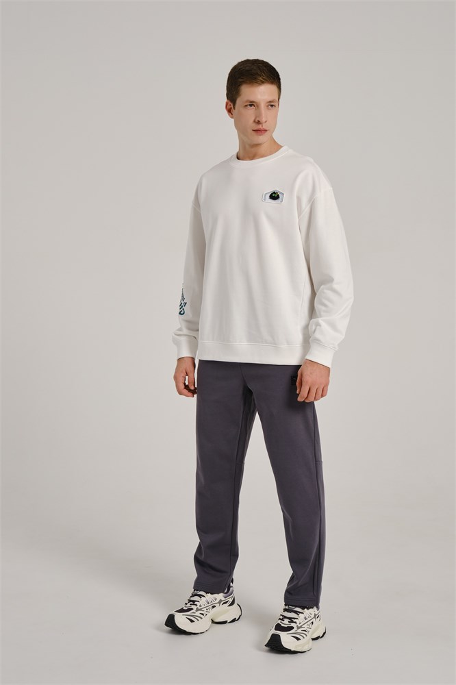 Купить оптом Брюки трикотажные утепленные Anta TRN Knit Track Брюки 852537307D-2 852537307D-2