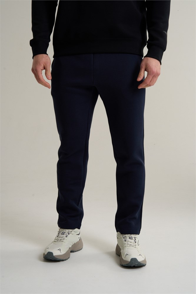 Купить оптом Брюки трикотажные Anta TRN ESSENTIAL Knit Track Брюки 852617310S-2 852617310S-2