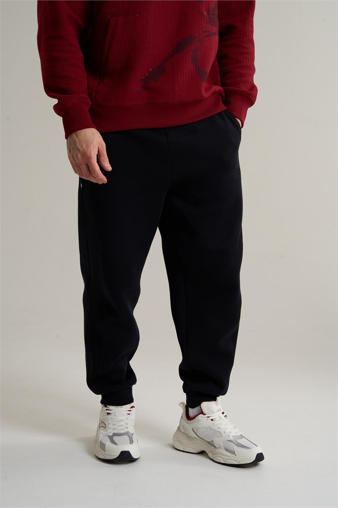Купить оптом Брюки трикотажные Anta ICONIC Knit Track Брюки 852618309-2 852618309-2