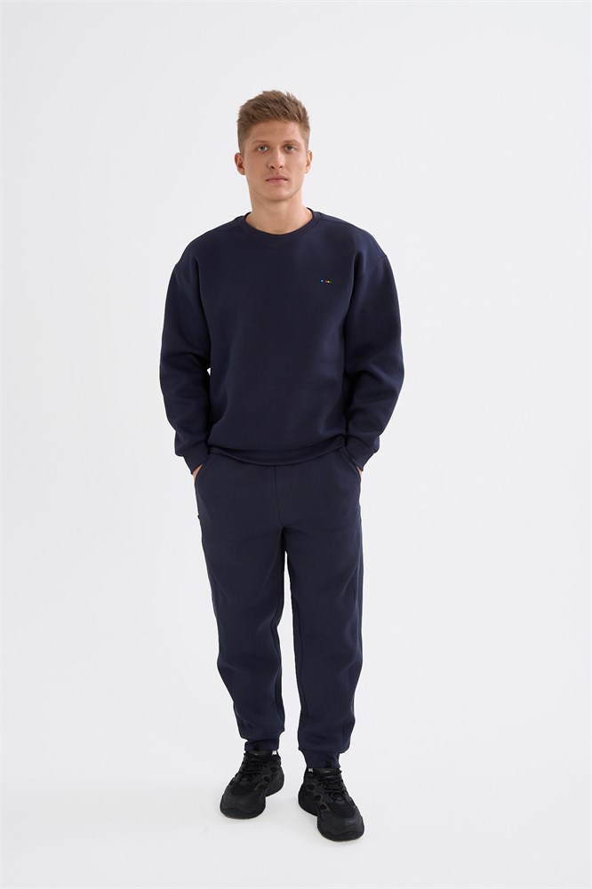 Купить оптом Брюки трикотажные Anta ICONIC Knit Track Брюки 852618309-4 852618309-4
