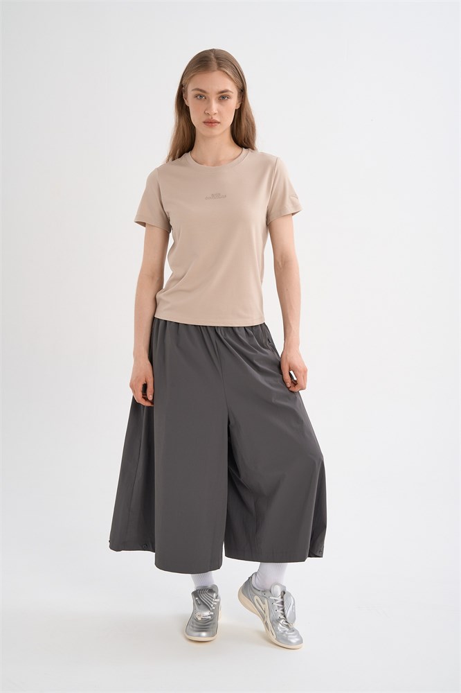 Купить оптом Брюки-кюлоты Anta ICONIC Woven 3/4 Брюки 862628516-1 862628516-1