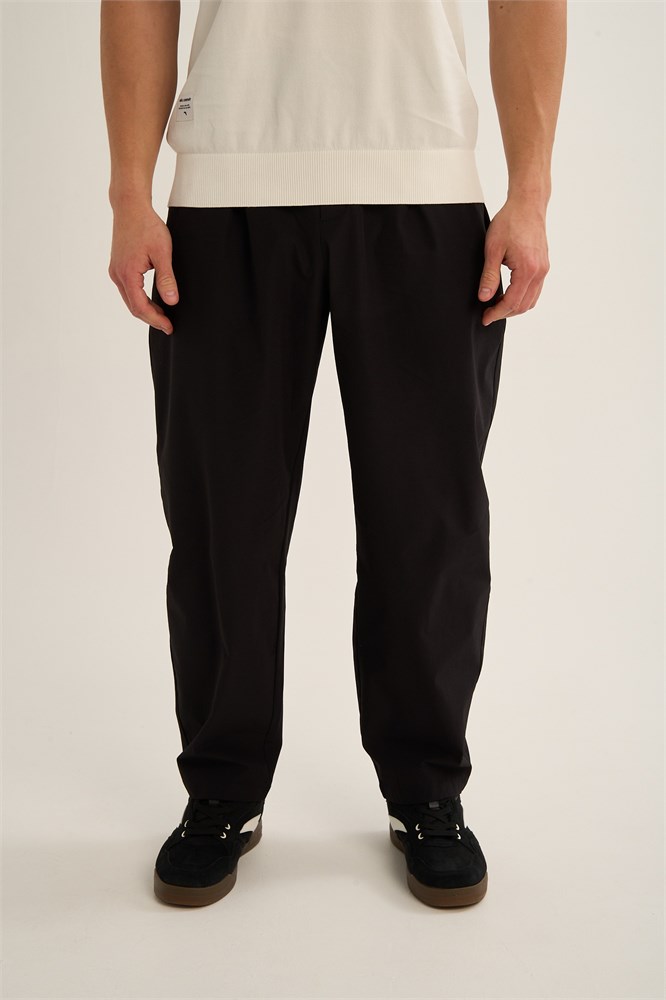 Купить оптом Брюки текстильные Anta COMMUTE Woven Casual Брюки 852637507-1 852637507-1