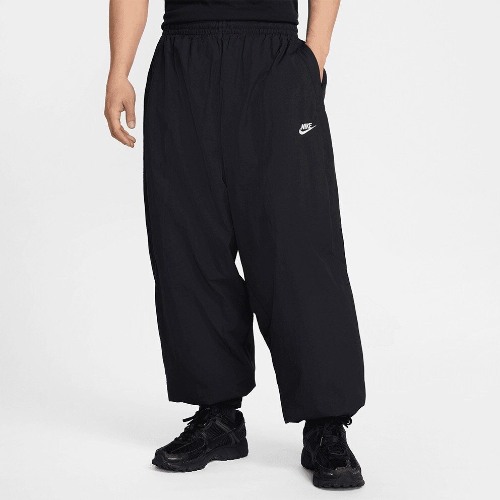 Купить оптом Брюки Nike M NK CLUB WVN TRK PANT OS HQ6114-010 BLACK/WHITE Male HQ6114-010 - фото 89907