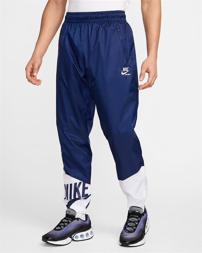 Купить оптом Брюки Nike M NK WR WVN LND GFX PANT HJ2034-492 BLUE VOID/WHITE/SAIL Male HJ2034-492 - фото 91752
