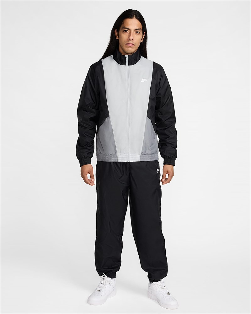 Купить оптом Костюм Nike M NK CLUB WVN TRK SUIT BLACK/SMOKE GREY/LT SMOKE GREY/WHITE MENS L HJ1985-010 - фото 95359
