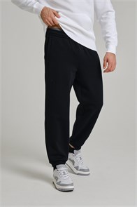 {{photo.Alt || photo.Description || 'Купить оптом Брюки трикотажные утепленные Anta CAMPUS Knit Track Брюки 852538308D-3'}}