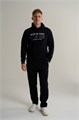 Купить оптом Брюки трикотажные Anta KT Knit Track Брюки 852611313S-1 852611313S-1