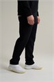 Купить оптом Брюки трикотажные Anta KT Knit Track Брюки 852611313S-1 852611313S-1