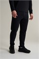 Купить оптом Брюки трикотажные утепленные Anta RUNNING Knit Track Брюки 852615301-1 852615301-1