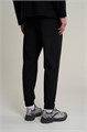 Купить оптом Брюки трикотажные Anta TRN Knit Track Брюки 852617302S-1 852617302S-1