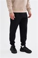 Купить оптом Брюки трикотажные Anta COMMUTE Knit Track Брюки 852617305-1 852617305-1