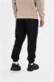 Купить оптом Брюки трикотажные Anta COMMUTE Knit Track Брюки 852617305-1 852617305-1