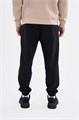 Купить оптом Брюки трикотажные Anta COMMUTE Knit Track Брюки 852617305-1 852617305-1