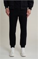 Купить оптом Брюки трикотажные Anta TRN ESSENTIAL Knit Track Брюки 852617309S-1 852617309S-1