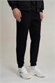 Купить оптом Брюки трикотажные Anta TRN ESSENTIAL Knit Track Брюки 852617309S-1 852617309S-1