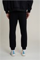 Купить оптом Брюки трикотажные Anta TRN ESSENTIAL Knit Track Брюки 852617309S-1 852617309S-1