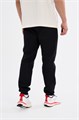 Купить оптом Брюки трикотажные удлиненные Anta TRN ESSENTIAL Knit Track Брюки 852617309SL-1 852617309SL-1