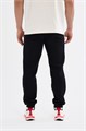 Купить оптом Брюки трикотажные удлиненные Anta TRN ESSENTIAL Knit Track Брюки 852617309SL-1 852617309SL-1
