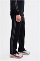 Купить оптом Брюки трикотажные Anta TRN ESSENTIAL Knit Track Брюки 852617311-1 852617311-1