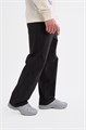Купить оптом Брюки текстильные Anta SKATE Woven Casual Брюки 852618510-3 852618510-3