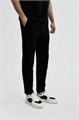 Купить оптом Брюки трикотажные Anta TRN-ESSENTIAL Knit Track Брюки 852627320-1 852627320-1