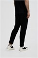 Купить оптом Брюки трикотажные Anta TRN-ESSENTIAL Knit Track Брюки 852627320-1 852627320-1