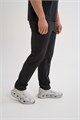 Купить оптом Брюки текстильные Anta Брюки BAR Woven Track Брюки 852627503-4 852627503-4