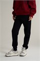 Купить оптом Брюки трикотажные удлиненные Anta TRN ESSENTIAL Knit Track Брюки 862617305SL-1 862617305SL-1