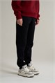 Купить оптом Брюки трикотажные удлиненные Anta TRN ESSENTIAL Knit Track Брюки 862617305SL-1 862617305SL-1