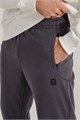 Купить оптом Брюки трикотажные утепленные Anta TRN Knit Track Брюки 852537307D-2 852537307D-2