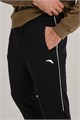 Купить оптом Брюки трикотажные утепленные Anta TRN Knit Track Брюки 852537309D-4 852537309D-4