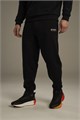 Купить оптом Брюки трикотажные утепленные Anta ATSC Knit Track Брюки 852548305-1 852548305-1