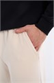 Купить оптом Брюки трикотажные Anta COMMUTE Knit Track Брюки 852617308-3 852617308-3