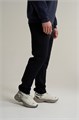 Купить оптом Брюки трикотажные удлиненные Anta TRN ESSENTIAL Knit Track Брюки 852617310SL-1 852617310SL-1