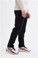 Купить оптом Брюки трикотажные Anta TRN Knit Track Брюки 852617312-1 852617312-1