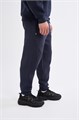 Купить оптом Брюки трикотажные Anta ICONIC Knit Track Брюки 852618309-4 852618309-4