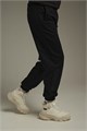 Купить оптом Брюки трикотажные утепленные Anta CAMPUS Knit Track Брюки 862438304E-3 862438304E-3