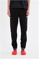 Купить оптом Брюки трикотажные удлиненные Anta TRN ESSENTIAL Knit Track Брюки 862617303L-1 862617303L-1