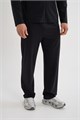 Купить оптом Брюки трикотажные Anta KT Knit Track Брюки 852621330-1 852621330-1