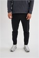 Купить оптом Брюки трикотажные Anta RUNNING Knit Track Брюки 852625301-1 852625301-1