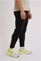 Купить оптом Брюки текстильные укороченные Anta RUNNING Woven Ankle Брюки 852625507-2 852625507-2