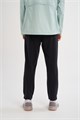 Купить оптом Брюки трикотажные укороченные Anta TRN Knit Ankle Брюки 862627306-1 862627306-1