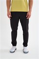 Купить оптом Брюки текстильные удлиненные Anta RUNNING Woven Track Брюки 852635501NL-1 852635501NL-1