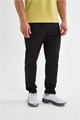 Купить оптом Брюки текстильные удлиненные Anta RUNNING Woven Track Брюки 852635501NL-1 852635501NL-1
