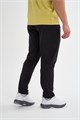 Купить оптом Брюки текстильные удлиненные Anta RUNNING Woven Track Брюки 852635501NL-1 852635501NL-1