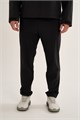 Купить оптом Брюки трикотажные Anta TRN-ESSENTIAL Knit Track Брюки 852627321-1 852627321-1